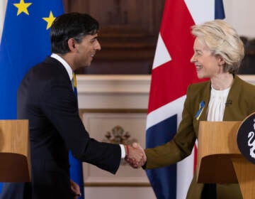 British Prime Minister Rishi Sunak (left) and European Commission President Ursula von der Leyen shake hands after a news conference at Windsor Guildhall, Windsor, England, Monday. The U.K. and the European Union ended years of wrangling, sealing a deal to resolve a dispute over Northern Ireland. (Dan Kitwood/AP)