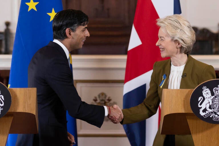 British Prime Minister Rishi Sunak (left) and European Commission President Ursula von der Leyen shake hands after a news conference at Windsor Guildhall, Windsor, England, Monday. The U.K. and the European Union ended years of wrangling, sealing a deal to resolve a dispute over Northern Ireland. (Dan Kitwood/AP)