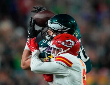 Philadelphia Eagles tight end Dallas Goedert (88) catches a pass as Kansas City Chiefs safety Bryan Cook (6) defends during the second half of Super Bowl LVII