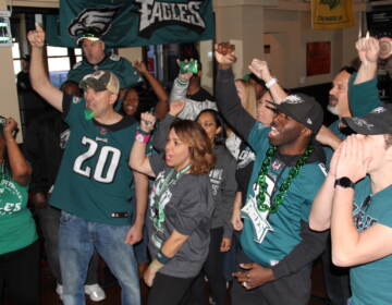 Members of Eagles Zone AZ packed Philly's Sports Grill in Tempe, Az. on Feb. 10, 2023 ahead of Super Bowl LVII on Sunday. (Cory Sharber/WHYY)