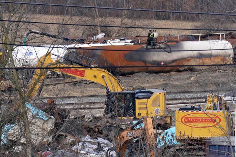 A view of workers cleaning up the train derailment near East Palestine, Ohio.