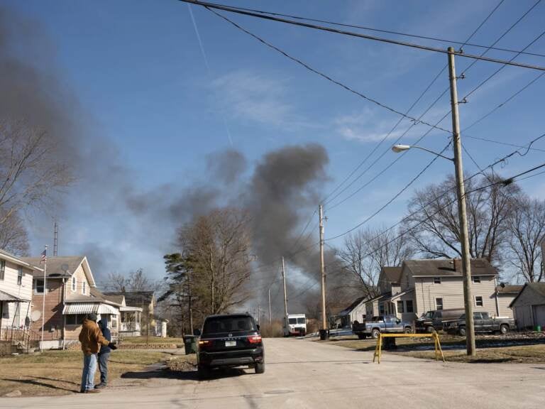 Smoke rises from a derailed cargo train in East Palestine, Ohio, on Feb. 4