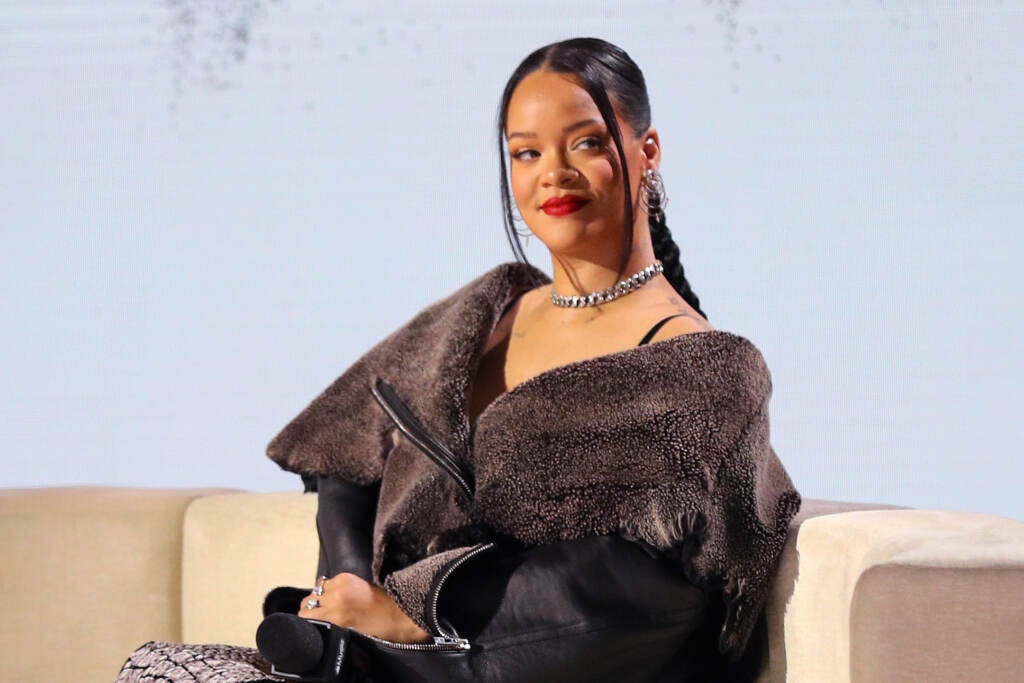 A close-up of Rihanna, smiling.