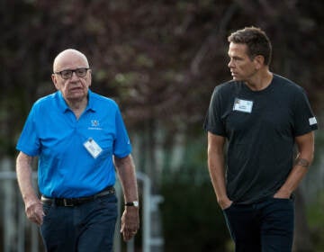 In a $1.6 billion defamation suit, Dominion Voting Systems argues that Fox Corp. bosses Rupert Murdoch (left) and Lachlan Murdoch (right) were deeply involved in shaping editorial decisions at Fox News. (Drew Angerer/Getty Images)