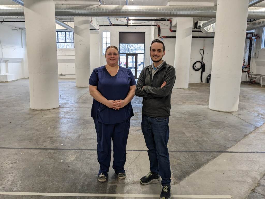 Kim Hartzell (left) and Chase Miller of The Bridge Clinic stand in what will be the organization's new office at the Frankford Arsenal in Bridesburg.