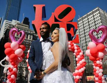 File photo: Arthur and Angie Long get married in Love Park on Valentine’s Day. (Emma Lee/WHYY)