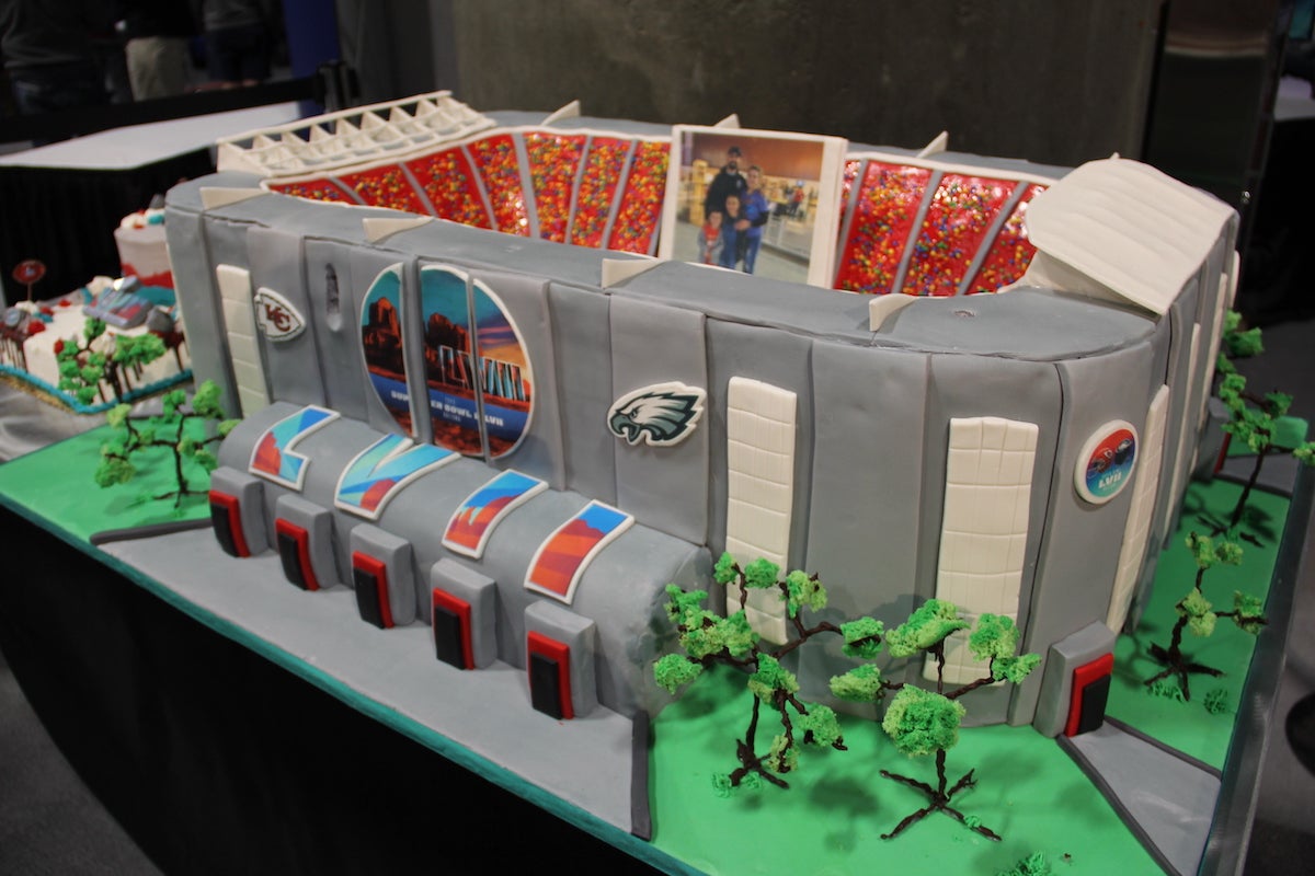 A close-up view of a cake modeled on State Farm stadium in Arizona.
