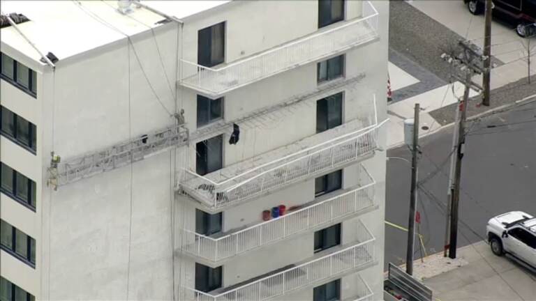 A view of a collapsed balcony in a highrise.