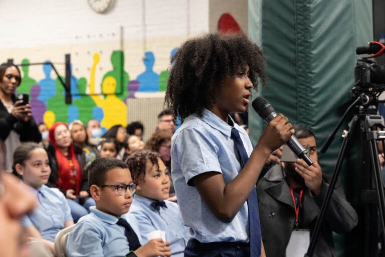 Donny Benjamin asks Philly mayoral candidates a question at a forum at Gloria Casarez Elementary