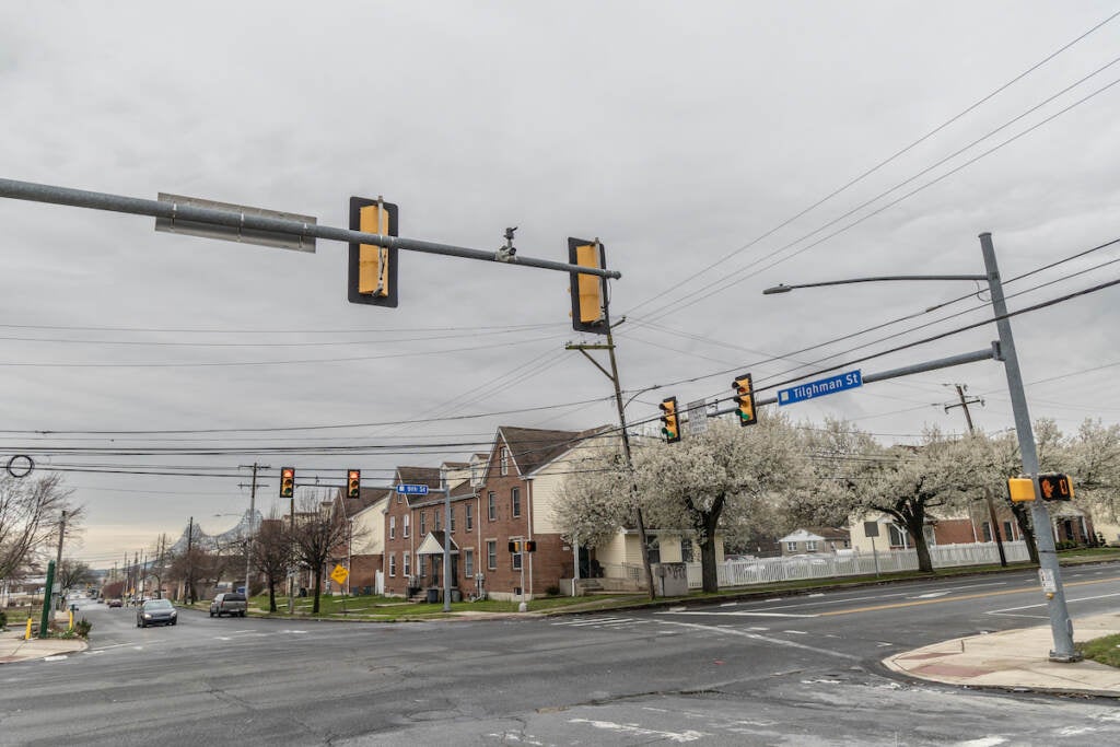 A view of an intersection with security cameras.