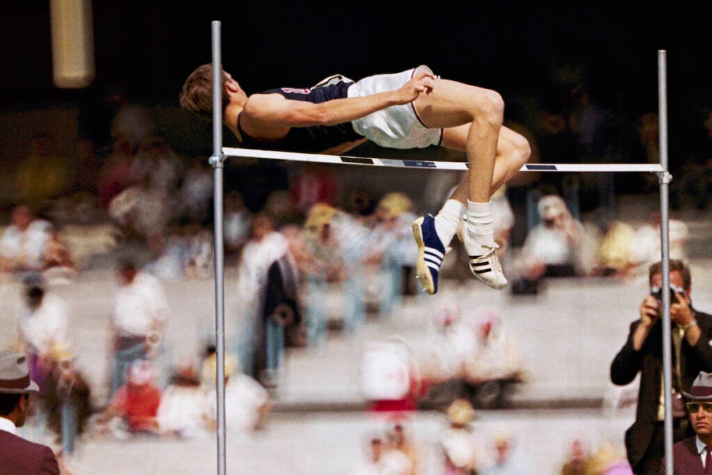 Dick Fosbury, of USA, clears the bar in the high-jump at the 1968 Mexico City Olympics