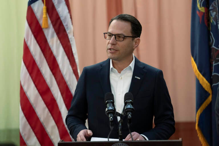 Gov. Josh Shapiro speaks at a podium.