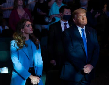 President Donald Trump attends church at International Church of Las Vegas with counselor Hope Hicks, left, Sunday, Oct. 18, 2020, in Las Vegas