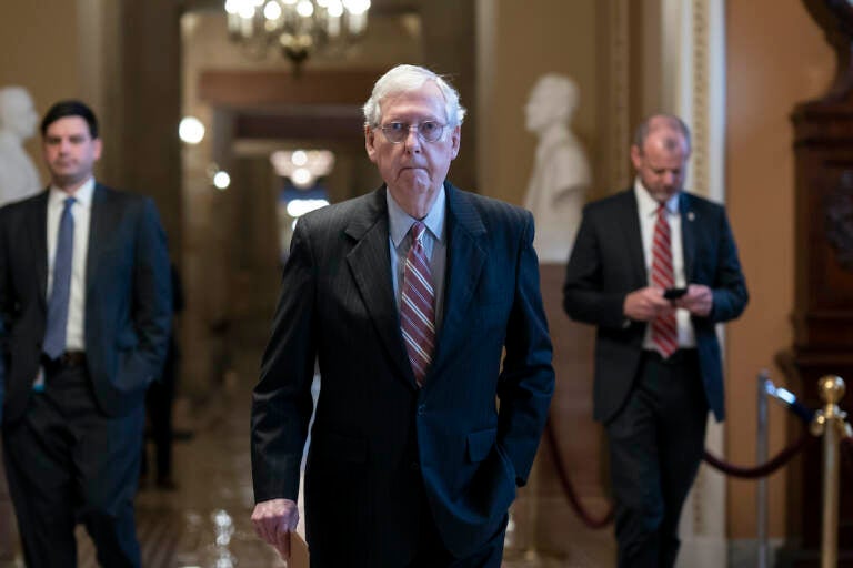 Senate Minority Leader Mitch McConnell, R-Ky., walks to the chamber