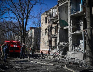Ukrainian Emergency Service rescuers work on a building damaged by shelling in Kramatorsk, Donetsk region, Ukraine