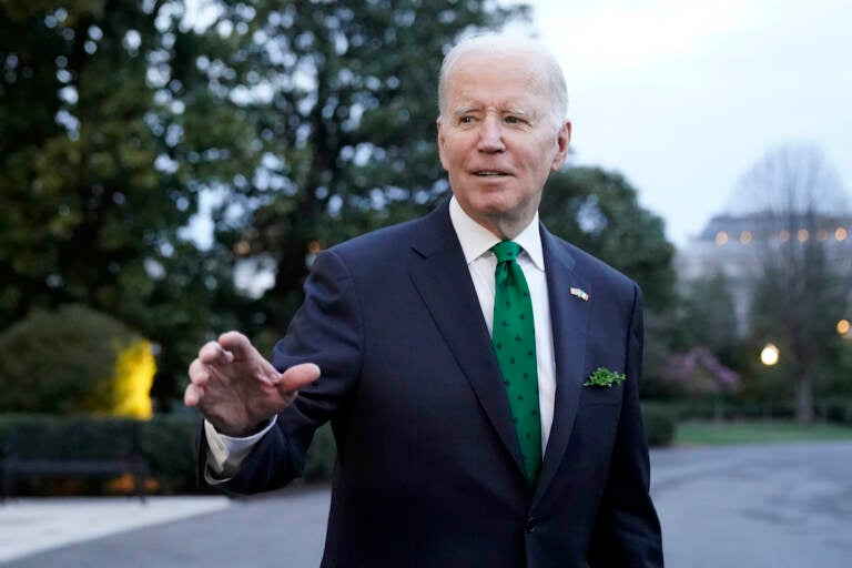 President Joe Biden waves as he walks to Marine One upon departure from the South Lawn of the White House, Friday, March 17, 2023, in Washington