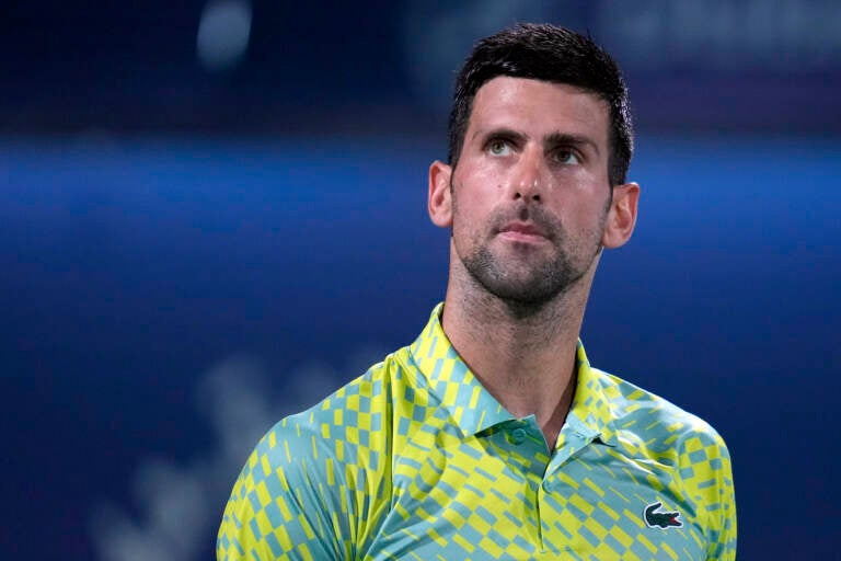Serbia's Novak Djokovic looks up during the quarterfinals of the Dubai Duty Free Tennis Championships in Dubai, United Arab Emirates