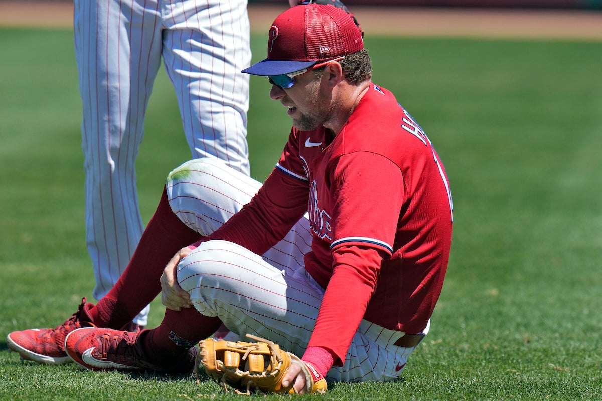 The Athletic MLB on X: Phillies first baseman Rhys Hoskins was carted off  the field after suffering an apparent left knee injury during  Philadelphia's game against Detroit on Thursday.    /