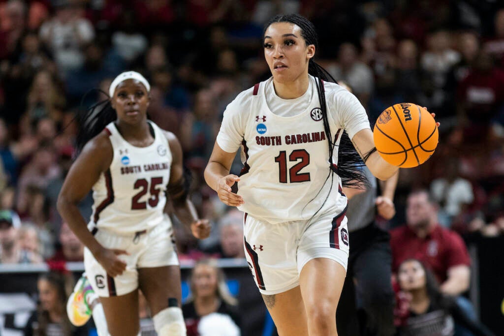 South Carolina's Brea Beal (12) brings the ball upcourt against Maryland in the second half of an Elite 8 college basketball game of the NCAA Tournament in Greenville