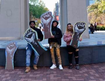 Care, Not Control youth leaders (including Bre Stoves- center) pose during a pop-up performance of music from Care, Not Control: The Album in North Philadelphia. (Courtesy of Naomieh Jovin)