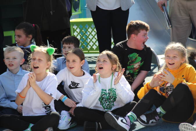Kids were excited for the reopening of Glavin Playground on March 16, 2023, following a more than $3 million renovation plan. (Cory Sharber/WHYY)