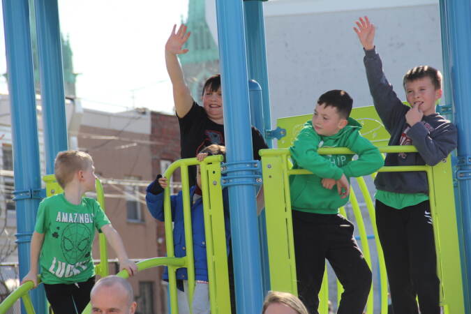 Kids were excited for the reopening of Glavin Playground on Mar. 16, 2023, following a more than $3 million renovation plan. (Cory Sharber/WHYY)