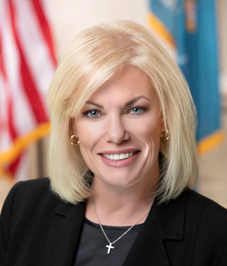 A headshot of State Sen. Nicole Poore, smiling.