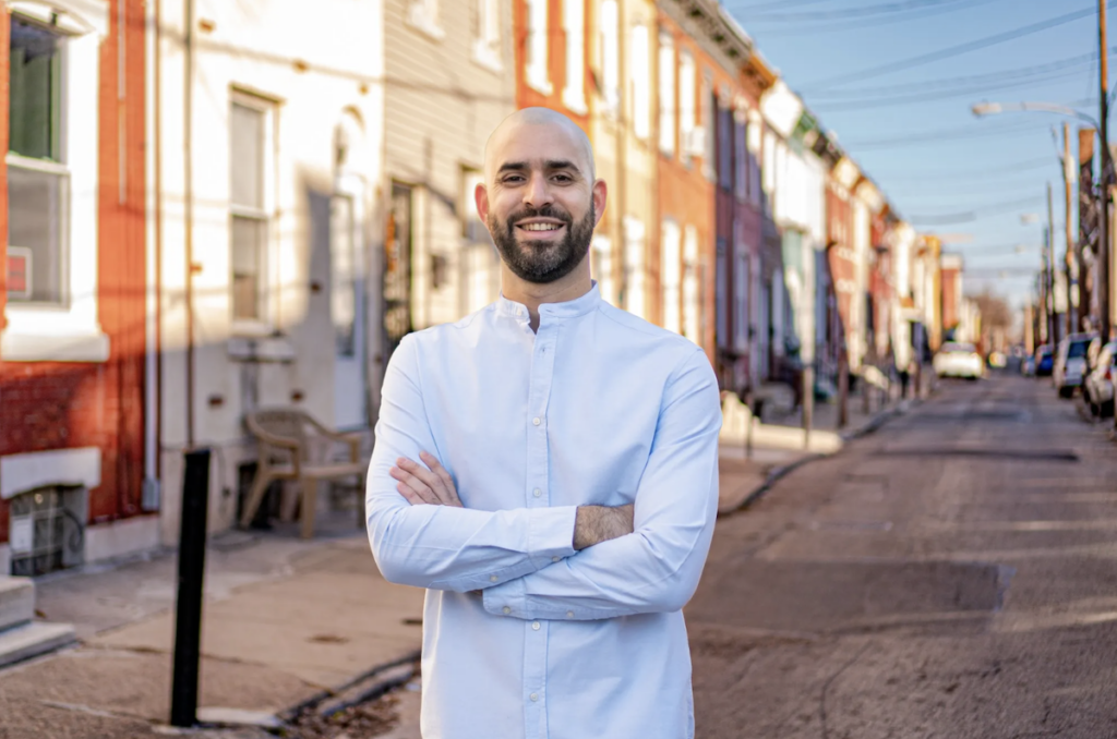 Andrés Celin standing on a city street