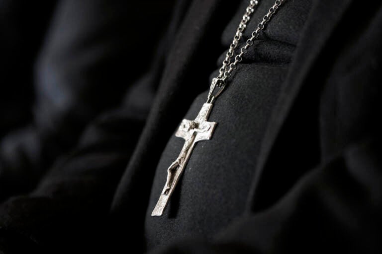 A close-up of a crucifix worn by a bishop.