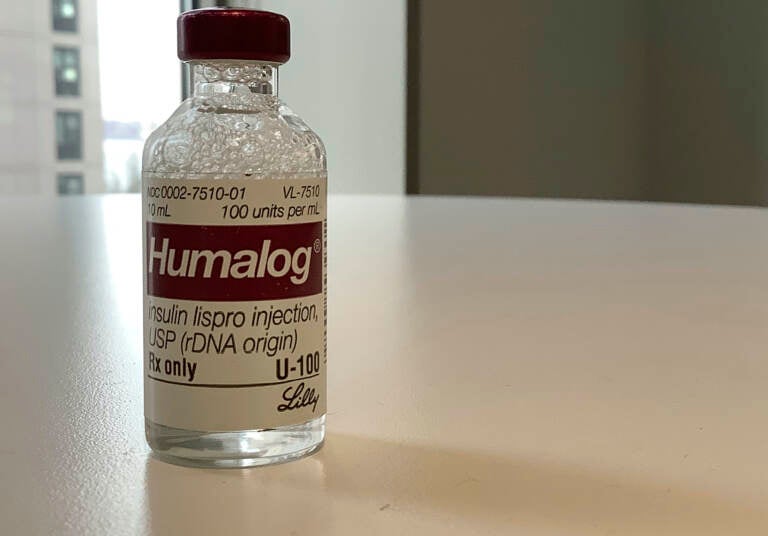 This Wednesday, March 1, 2023 photo shows a vial of Eli Lilly's Humalog insulin in New York. Eli Lilly will cut prices for some older insulins later this year and immediately give more patients access to a cap on costs they pay to fill prescriptions. (AP Photo/Pablo Salinas)