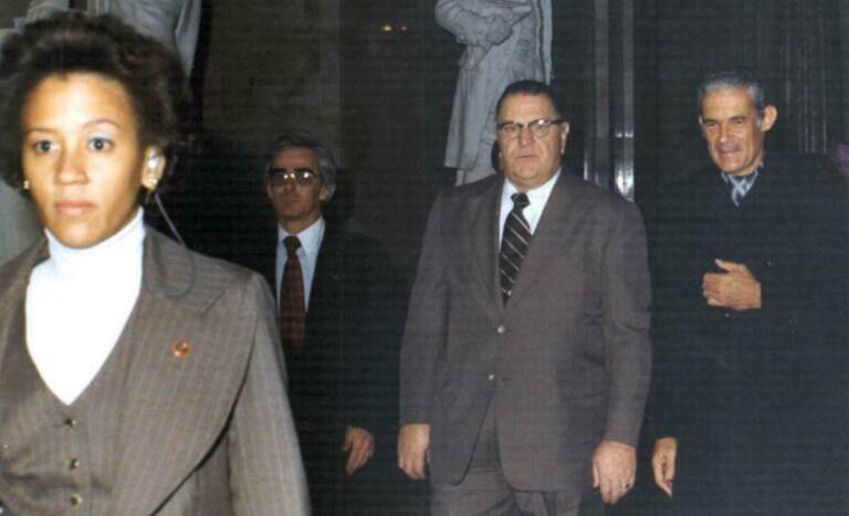 Zandra Flemister, the first Black woman in the Secret Service, left the agency after four years because of discrimination. She is seen here escorting Prime Minister of Jamaica Michael Manley during his 1977 visit to Washington.