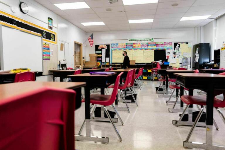 A Louisville, Ky., classroom sits empty in January 2022, during a COVID surge driven by the omicron variant. Students lost the routine of going to school during the pandemic, and now many are struggling to get back in the habit