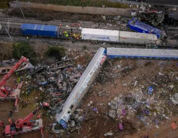 Emergency crews continue to search through the wreckage after a train accident in the Tempe Valley near Larissa, Greece on Tuesday evening. At least 43 people were killed