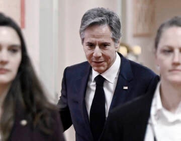 Secretary of State Antony Blinken walks to a meeting on the sidelines of the G-20 foreign ministers' meeting in New Delhi on Thursday