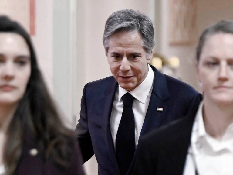 Secretary of State Antony Blinken walks to a meeting on the sidelines of the G-20 foreign ministers' meeting in New Delhi on Thursday