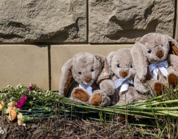 Items are left at a makeshift memorial at the entrance of The Covenant School after a mass shooting on March 28, 2023 in Nashville, Tennessee. According to reports, three students and three adults were killed by the 28-year-old shooter on Monday.  (Photo by Seth Herald/Getty Images)