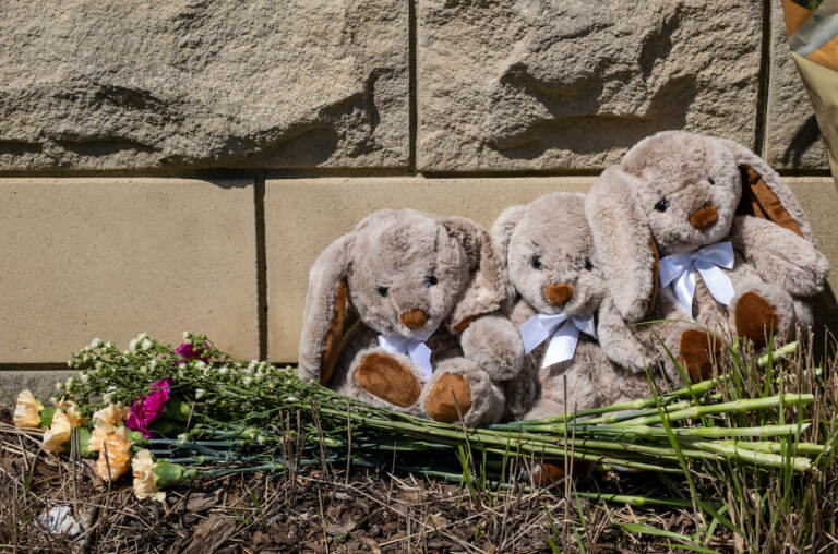 Items are left at a makeshift memorial at the entrance of The Covenant School after a mass shooting on March 28, 2023 in Nashville, Tennessee. According to reports, three students and three adults were killed by the 28-year-old shooter on Monday.  (Photo by Seth Herald/Getty Images)