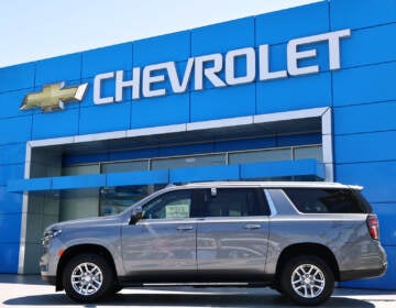 Brand-new Nissan vehicles sit on a sales lot in Richmond, Calif.