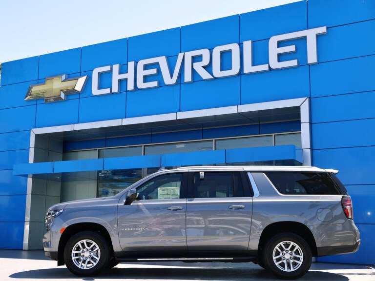 Brand-new Nissan vehicles sit on a sales lot in Richmond, Calif.