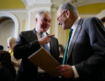 2 Senators talking to each other