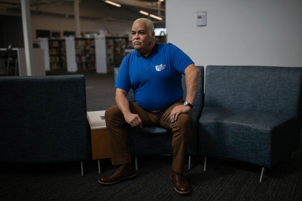 Samuel Camacho, a health insurance navigator with the Universal Health Care Action Network of Ohio, at the library in Columbus, OH on March 19, 2023. Camacho helps Spanish-speaking residents with their Medicaid paperwork.