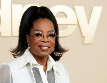 FILE - Oprah Winfrey, a producer of the documentary 'Sidney,' about actor Sidney Poitier, appears at the premiere on Sept. 21, 2022 in Los Angeles. Winfrey announced that she had chosen Ann Napolitano’s book 'Hello Beautiful' for her 100th book club pick. (AP Photo/Chris Pizzello, File)