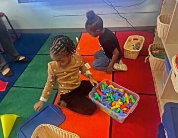 Lotus Barnes (foreground) and Daneri Owens enjoy play time at the Southbridge cente