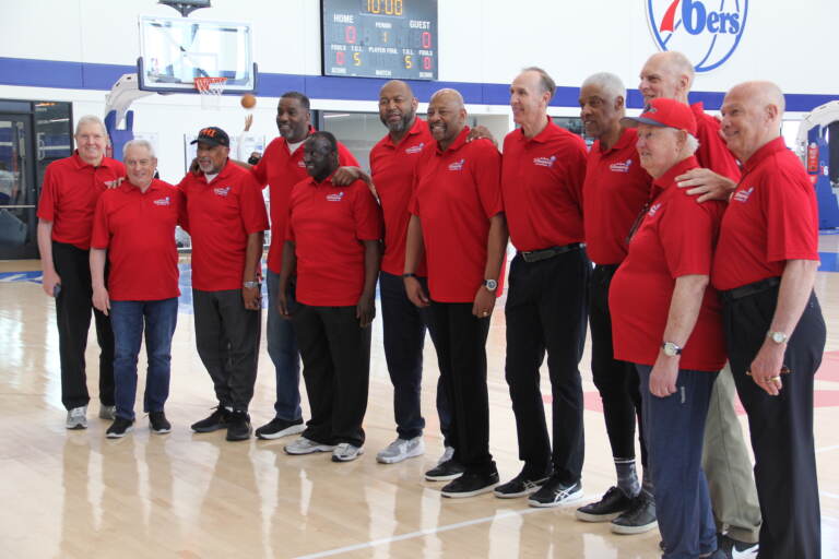 Members of the 1982-83 Philadelphia 76ers NBA Championship team gathered ahead of shootaround at the team's practice facility in Camden, New Jersey on Mar. 20, 2023. (Cory Sharber/WHYY)