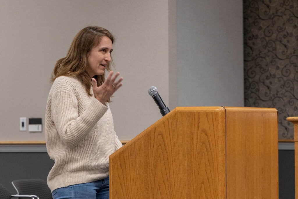 Jamie Hanaway speaks at a podium.