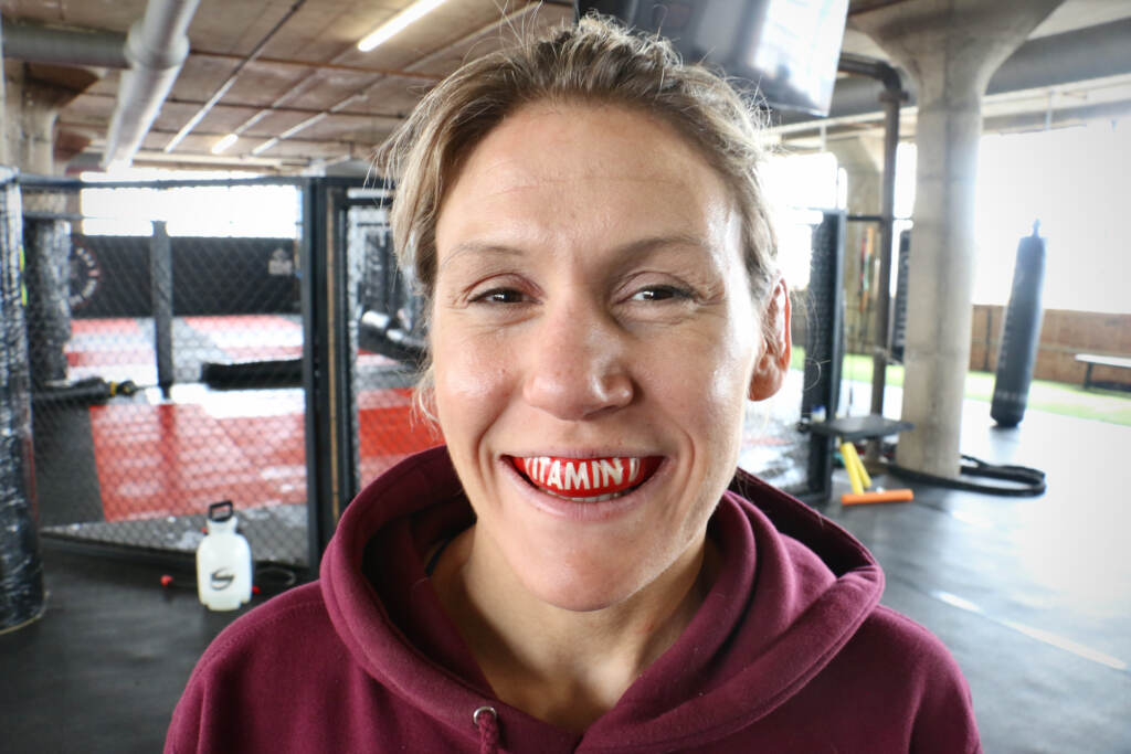 Mixed martial arts fighter DeAnna Bennett wears a mouthguard printed with her nickname, ''Vitamin D.'