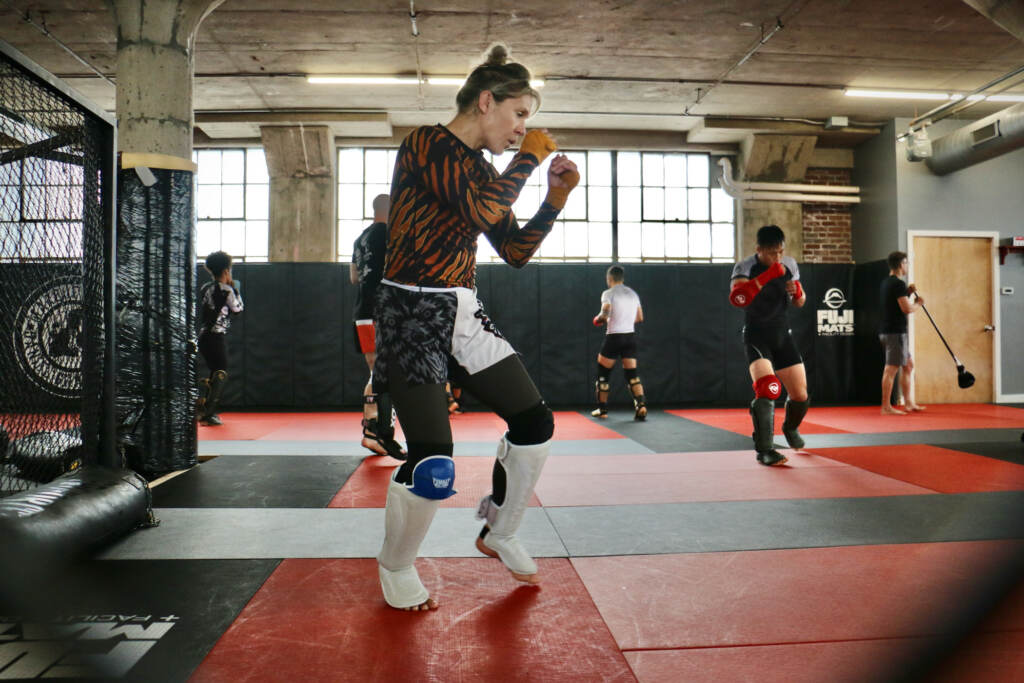 DeAnna Bennett, a contender for the mixed martial arts women's world championship, warms up for a practice session at Marquez MMA Gym