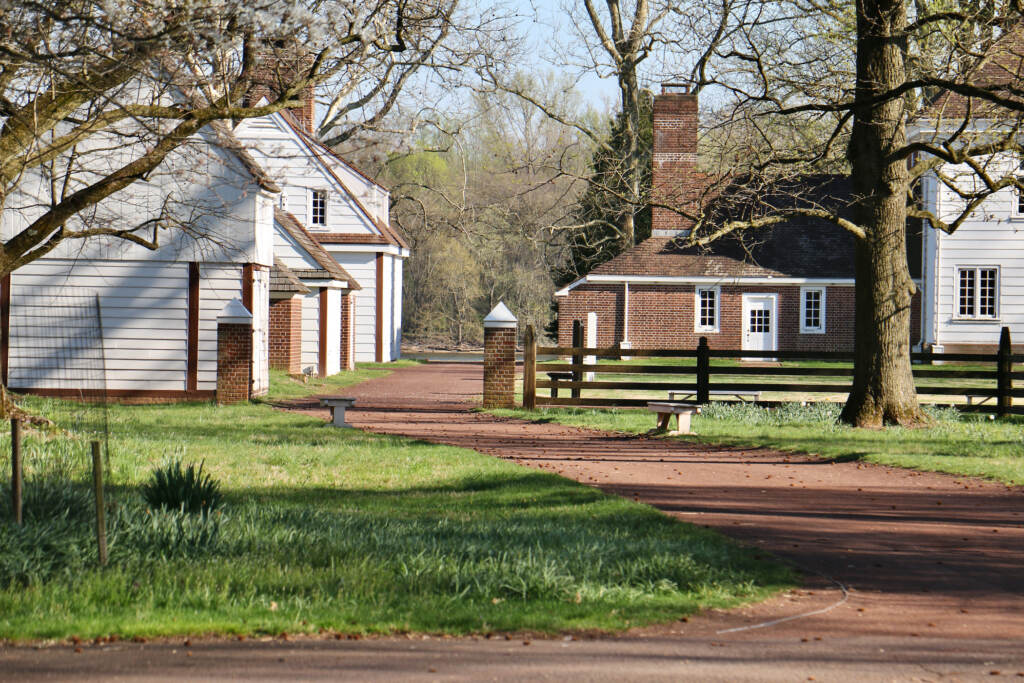 A path leads from the visitor center to the river, passing by the reconstructed buildings of Pennsbury Manor, the 17th century home of William Penn in Bucks County