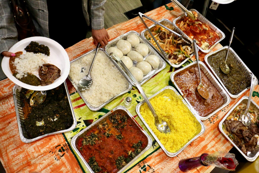 African cuisine prepared by Abdarahmane Diop at the African Small Pot on Woodland Avenue is served buffet style at the launch of Africatown Restaurant Week