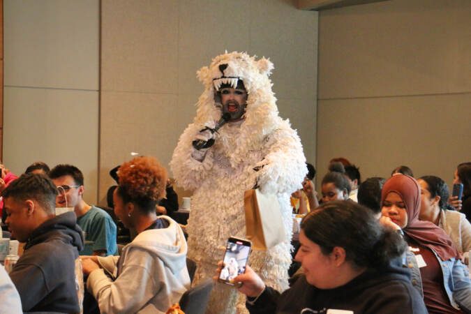 John Jarboe performs in a polar bear costume.